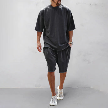 Men's oversized black T-shirt with a loose fit, suitable for casual urban fashion, featuring short sleeves and a relaxed design in a 3XL size.