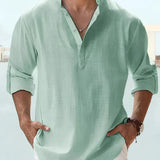 A man wearing a lightweight, breathable pink linen Henley shirt with long sleeves, showing his arm and shoulder while wearing a watch.