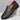 Men's premium blue leather penny loafers featuring a luxury slip-on design, showcased on a sleek surface.