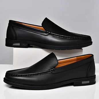 Men's premium blue leather penny loafers, luxury slip-on shoes showcasing a sleek design in electric blue with a subtle shine, emphasizing the leather material and refined craftsmanship.