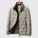 Men's beige quilted insulated lightweight winter jacket in size 4XL, featuring a windproof design with a high collar and long sleeves, displayed on a mannequin against a neutral background.