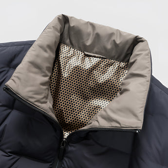 Men's grey quilted insulated lightweight winter jacket with a windproof design, featuring long sleeves, a comfortable collar, and a waist-length fit.
