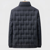 Men's quilted insulated lightweight windproof winter jacket with long sleeves, featuring a collar and buttons. The jacket is designed for warmth and style during cold weather, with a sleek, modern appearance.