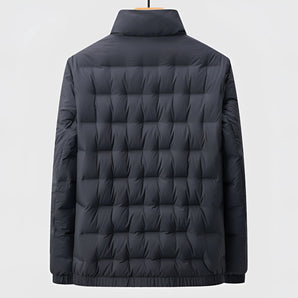 Men's quilted insulated lightweight windproof winter jacket with long sleeves, featuring a collar and buttons. The jacket is designed for warmth and style during cold weather, with a sleek, modern appearance.