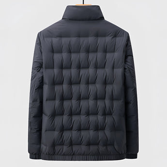 Men's quilted insulated lightweight windproof winter jacket with long sleeves, featuring a collar and buttons. The jacket is designed for warmth and style during cold weather, with a sleek, modern appearance.