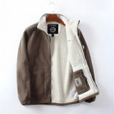 Men's red high-neck full zip fleece jacket featuring long sleeves and a collar, designed for warmth during winter.