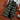 A green 8XL men's insulated puffer vest designed for hiking, showcasing its lightweight and water-resistant features.