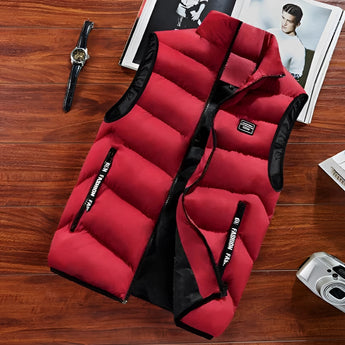 Men's red insulated puffer vest, lightweight and water-resistant, designed for hiking, size 8XL, displayed on a couch with wooden elements in the background.