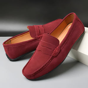 Men's red suede designer loafers with a luxurious and casual style, featuring a sleek design in size 48.
