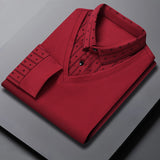 Men's red V-neck sweater with patterned shoulders, featuring long sleeves and a casual office wear style.
