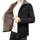 Men's reversible winter jacket in black and brown faux fur, featuring a long overcoat design, full sleeves, and a wide collar.