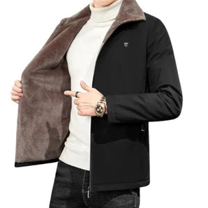 Men's reversible winter jacket in black and brown faux fur, featuring a long overcoat design, full sleeves, and a wide collar.