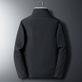 Men's reversible winter jacket with black and brown faux fur, featuring long sleeves, a collar, and buttons, designed for warmth and style with pockets for practicality.