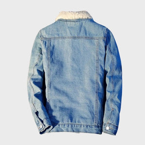 Men's sherpa-lined blue denim trucker jacket featuring a fleece collar, button closure, and multiple pockets.