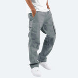 Men's slim fit gray cargo pants in a cotton blend, featuring multiple pockets and a sportswear-inspired design suitable for workwear and casual fashion.