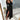 Men's black slim fit dress pants with tailored pleats, shown in a size 3XL, featuring a modern and stylish design suitable for formal occasions.