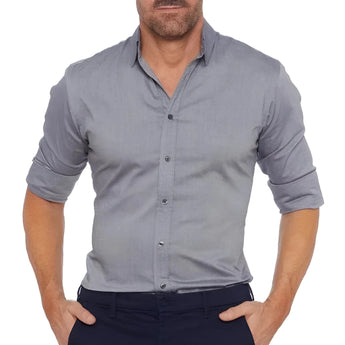 Men's slim fit black dress shirt with long sleeves and button-up closure, modeled by a person, highlighting the shirt's formal style and fit.