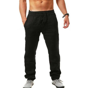 A pair of men's slim fit black joggers in a lightweight fabric, designed for athletic wear. The joggers are displayed in a size 3XL, showcasing their sleek and form-fitting style.