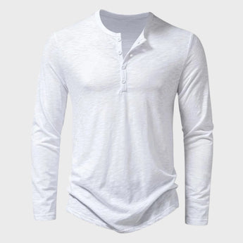 Men's slim fit black long sleeve Henley shirt made from cotton blend fabric, featuring a round collar and button placket, suitable for casual or semi-formal wear.
