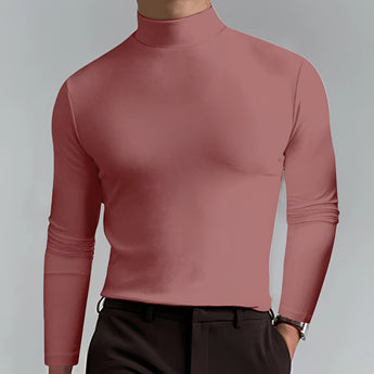 Men's slim fit black turtleneck shirt with long sleeves, elegantly showcasing shoulder and neck details, worn by a standing person.