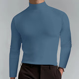 Men's slim fit black turtleneck shirt with long sleeves, showcased on a model.