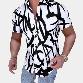 Men's slim fit shirt featuring a black and white abstract graffiti design, with a collared neckline and long sleeves.