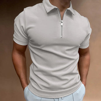 Men's gray slim fit polo shirt featuring a stylish black zipper, with short sleeves and a classic collar, suitable for casual occasions.