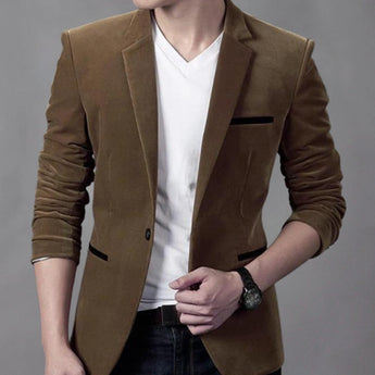 Men's slim fit brown corduroy blazer with a dark khaki hue, featuring long sleeves and a classic collar, styled for casual business fashion.