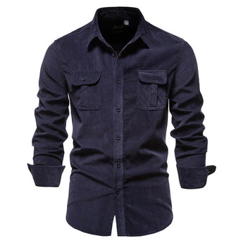 Men's slim fit dark blue denim shirt with long sleeves and a button-up front, featuring a classic collar. The casual top is designed for a stylish look in an electric blue color, suitable for various occasions.