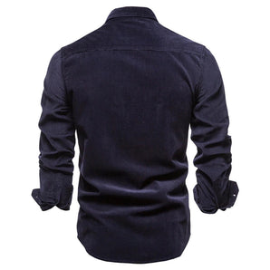Men's slim fit dark blue denim shirt with long sleeves and a collar, featuring a casual design suitable for everyday wear.