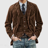 Men's brown slim fit corduroy blazer in size 3XL, paired with a black dress shirt and jeans, showcasing a stylish vintage look.