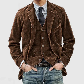 Men's slim fit dark gray corduroy blazer in vintage style, featuring long sleeves and a tailored fit, suitable for formal or semi-formal occasions.