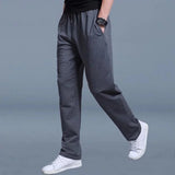 Men's dark gray slim-fit fleece joggers in size 3XL, featuring cuffed ankles and designed as part of a multipack collection.