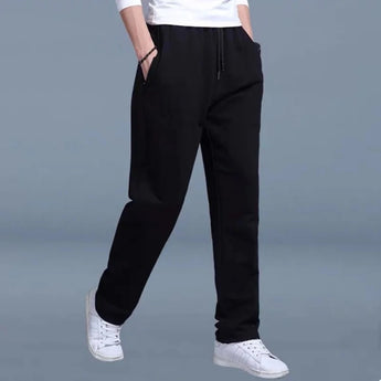 Men's black slim-fit fleece joggers with cuffed ankles in size 3XL, showcasing a comfortable and sporty design ideal for casual wear.