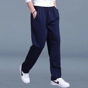 Men's dark blue slim-fit fleece joggers in 3XL size with cuffed ankles, displayed in a multipack.