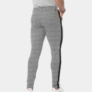 Men's slim-fit gray plaid trousers with a contrasting side stripe, showcasing a stylish and modern design.