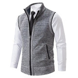 Men's slim fit light gray herringbone tweed vest made from a wool blend, featuring a button-down front and tailored design suitable for formal occasions.