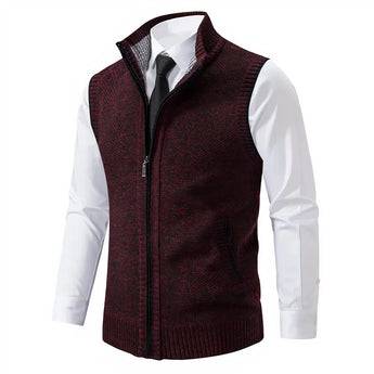 Men's slim fit herringbone tweed vest in brown wool blend, styled with collared dress shirt and blazer, highlighting button details and pattern design.