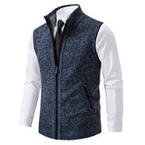 Men's slim fit herringbone tweed vest in brown wool blend, shown on mannequin, featuring button closure, v-neckline, and sleeveless design.