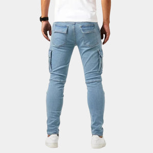 Men's slim fit light blue cargo jeans featuring zipper pockets, designed for a modern and stylish look.