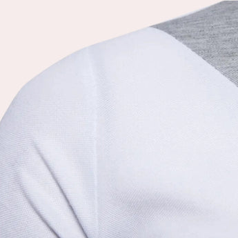 Men's slim fit light blue polo shirt made of breathable cotton featuring a classic collar and short sleeves.