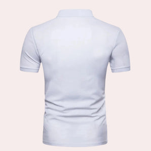 Men's light blue slim fit polo shirt made of breathable cotton fabric, featuring short sleeves and a classic collar design for a casual, sporty look.