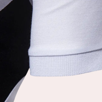 Men's slim fit light blue polo shirt featuring a classic collar and short sleeves, crafted from breathable cotton for comfort, with a subtle jersey texture.
