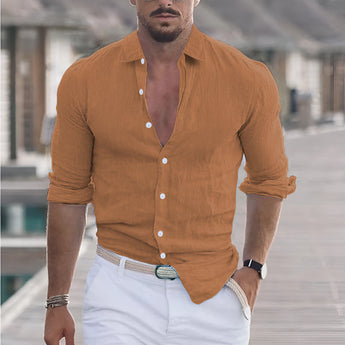 Men's slim fit gray linen shirt for summer fashion, featuring a breathable fabric, worn by a bearded model with rolled-up sleeves, showcasing the shoulder and neck details.