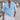 Men's slim fit linen shirt in light blue, 3XL, modeled by a man with a beard, showcasing breathable summer fashion with shoulder and neck details visible.