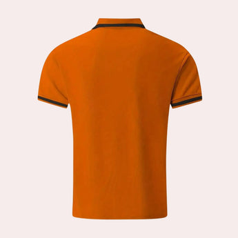 Men's slim-fit navy blue athletic polo with contrast piping, featuring a collar and short sleeves, designed for sportswear and active wear.