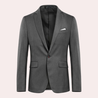 Men's slim fit navy blue blazer with a structured collar and long sleeves, designed for formal evening or party wear. The blazer is styled with a dress shirt and tie, adding a sophisticated touch to the outfit.