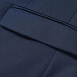 Men's slim fit navy blue blazer with formal design, featuring long sleeves and a sleek appearance suitable for evening and party wear.