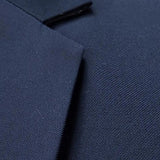 Men's slim fit navy blue blazer designed for formal evening and party occasions, featuring a classic collar and long sleeves, suitable for pairing with a dress shirt.