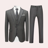 Men's gray slim fit blazer with a formal design, featuring a structured collar, full-length sleeves, and tailored fit, suitable for evening and party occasions.